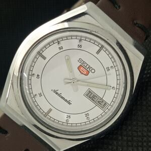 Vintage 1978 Seiko Automatic Silver Watch W/day-date, leather band. Runs well.